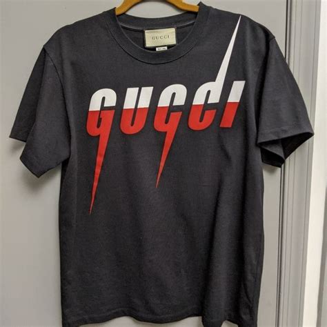 red and white Gucci shirt